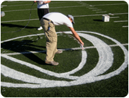 logos with removable paint on synthetic turf fields