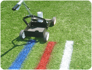 Aerosol Removable Paint for Synthetic Field Turf being sprayed.